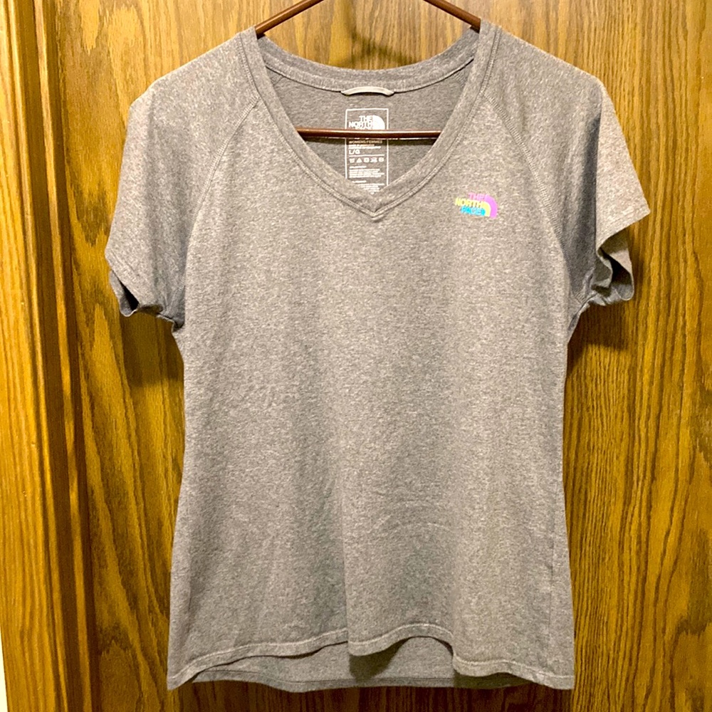 North face gray V-neck T-shirt. Size large, but fits like a medium.